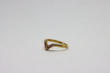  Gold V Ring with rubies and diamonds