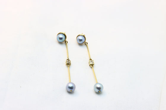 Gold Earrings with blue pearl and diamonds