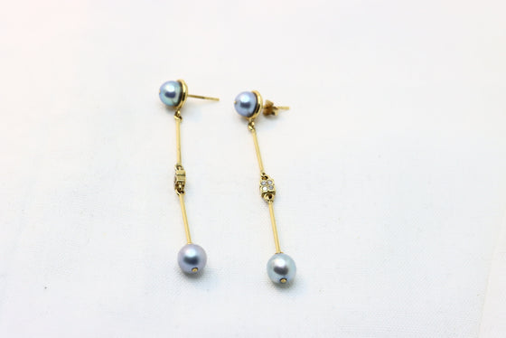 Gold Earrings with blue pearl and diamonds