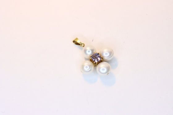 Gold Pearl Cross with tanzanite