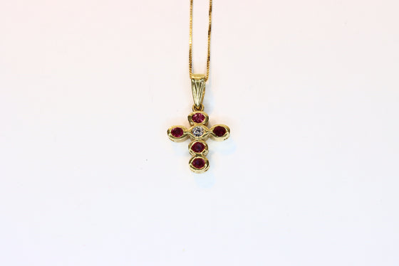 Gold Cross with rubies and diamond