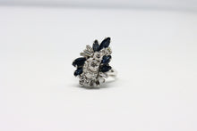  White Gold Ring with sapphire and diamonds