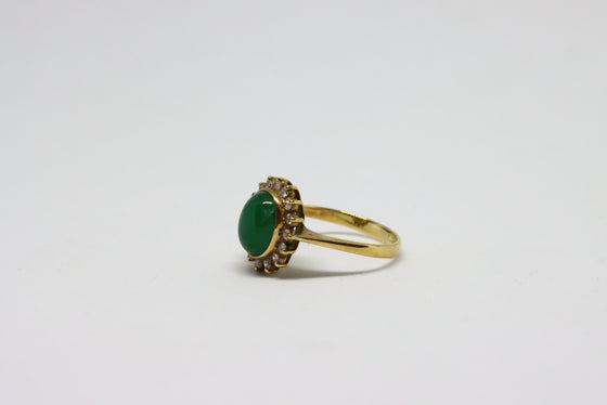 Gold Ring with emerald and diamonds