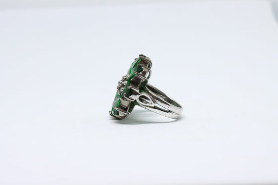 Silver Ring with emeralds and zircons