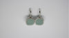 Silver earrings with zircons